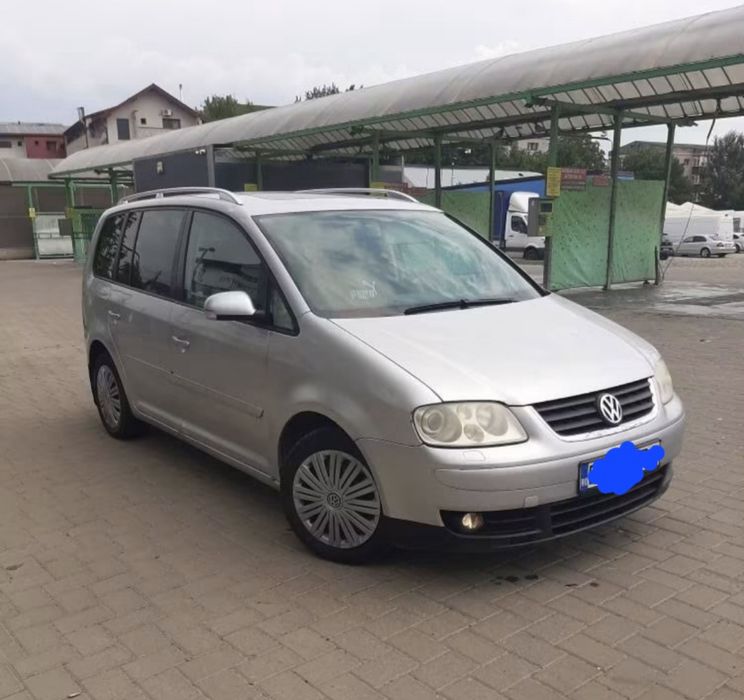 Vând volkswagen tuaran