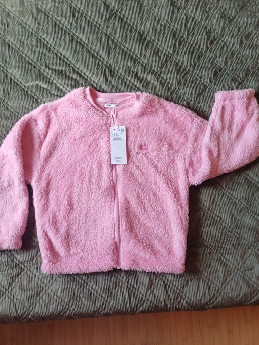 Жилетка, пухкаво яке, две блузки 134 р.