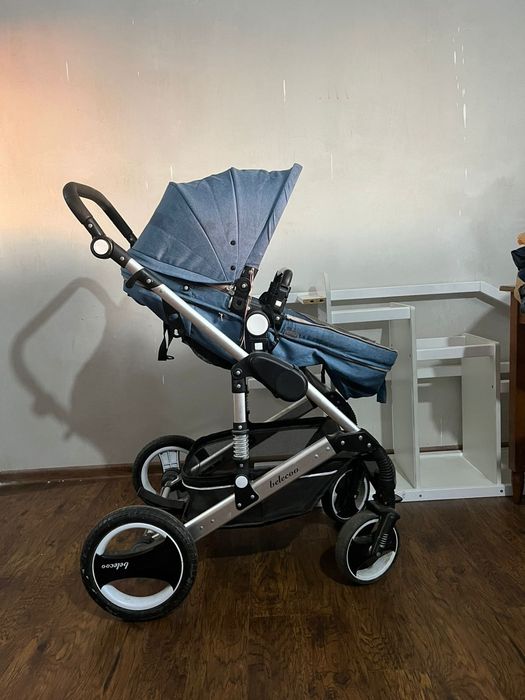 Продам детские коляски, ходунок, стульчик., и др.