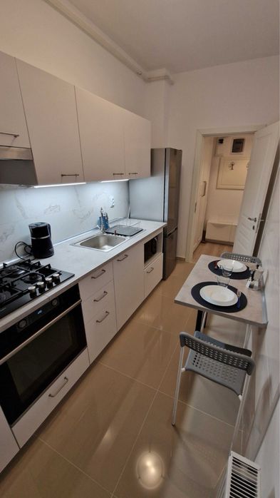 Garsonieră de închiriat + loc de parcare în Militari Residence