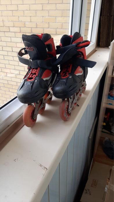 Роликовые коньки