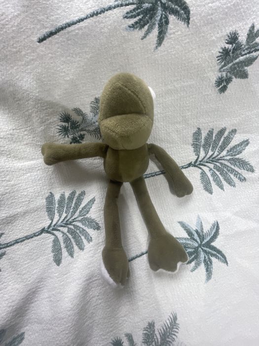 Игрушка в виде лягушки