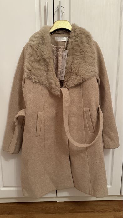 Продам новые пальто