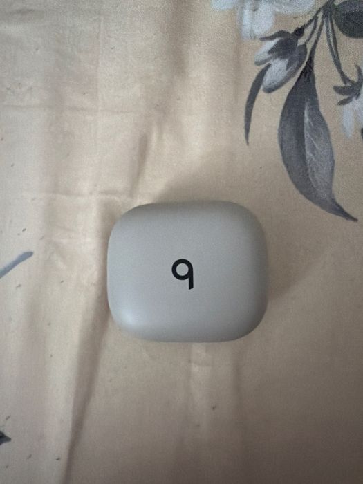 Casti wireless culoare gri stare foarte buna.