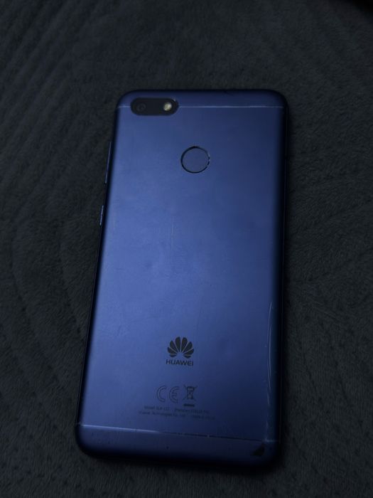 Телефон Huawei 7.0 и LG