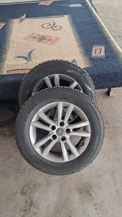 Диска с ризиной  на киа  215 60/R16