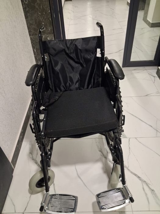 Инвалидная коляска