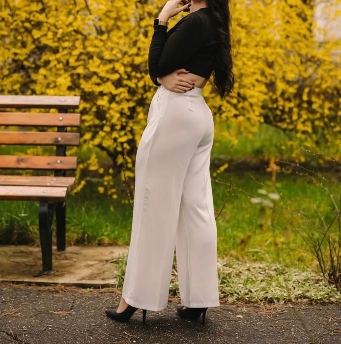 Pantaloni cu crac larg eleganți