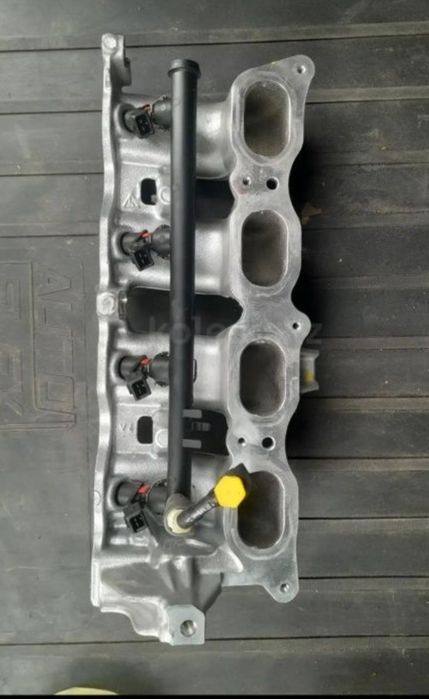 Впускной коллектор на дастер,