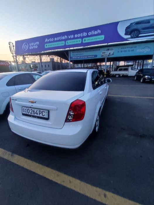 2023 Gentra Lasetti avtomat lyukli oq kraska toza