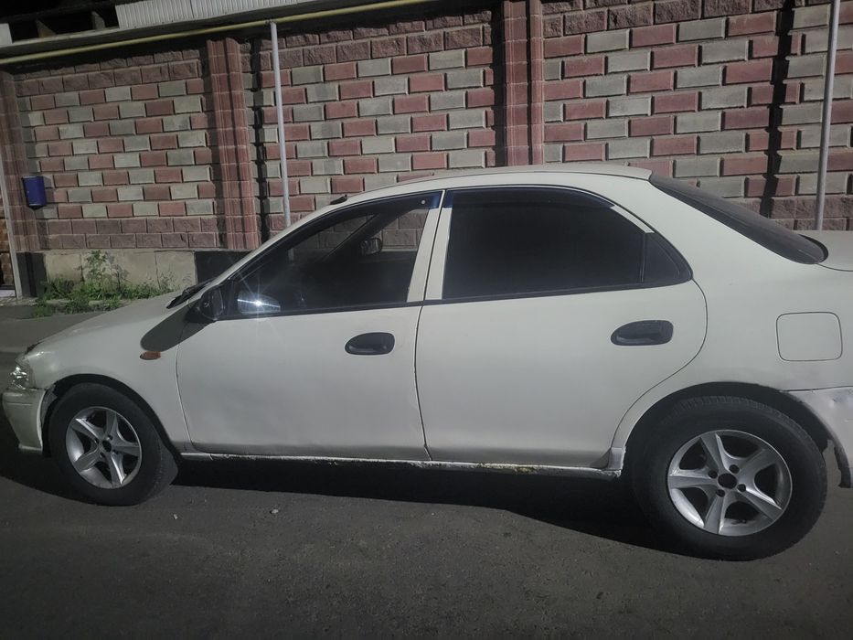 Мазда 323 Фамила