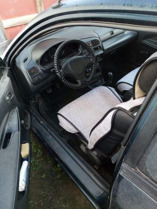 Мазда 323  обьём 1.6 л.