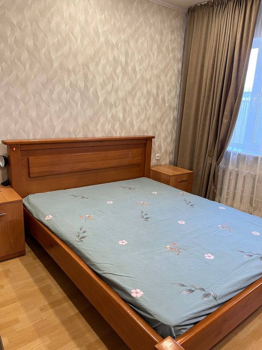 Деревянная кровать