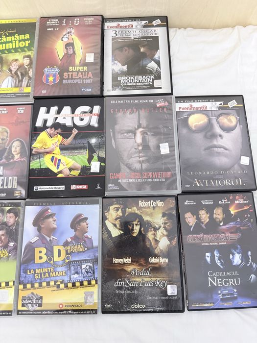 Vand DVD-uri noi