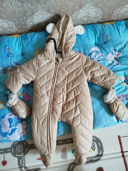 Продам  комбинезоны