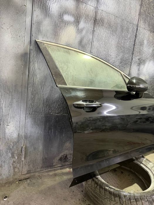 Kia K5.  2024 qora radnoy eshik
