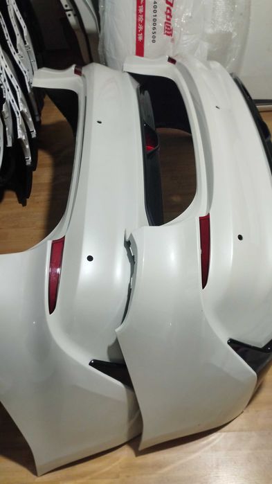 Monza  бампера двери фары