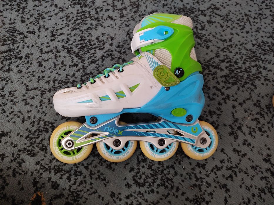 Роликовые коньки раздвижные Ridex