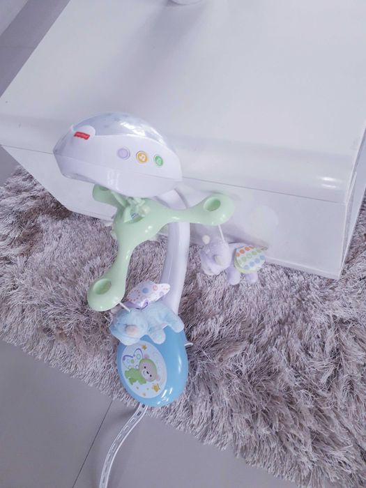 Carusel muzical patut bebe Fisher Price cu lumini, sunete