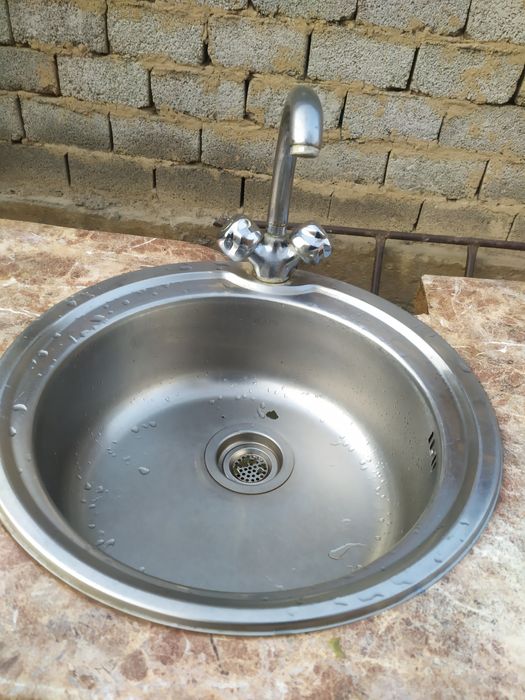 Смеситель раковина сотилади.