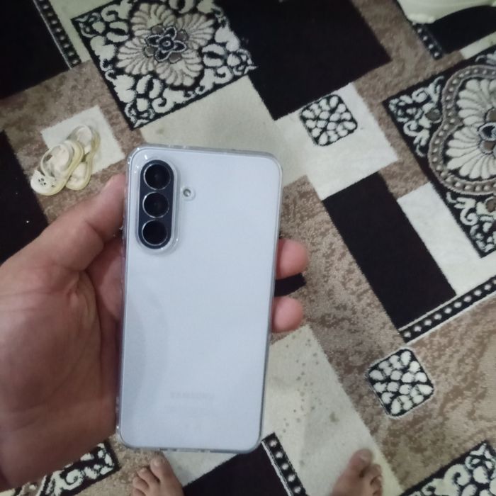 Samsung A 56 xolati yangiday xotirasi 128 8 oprativkasi