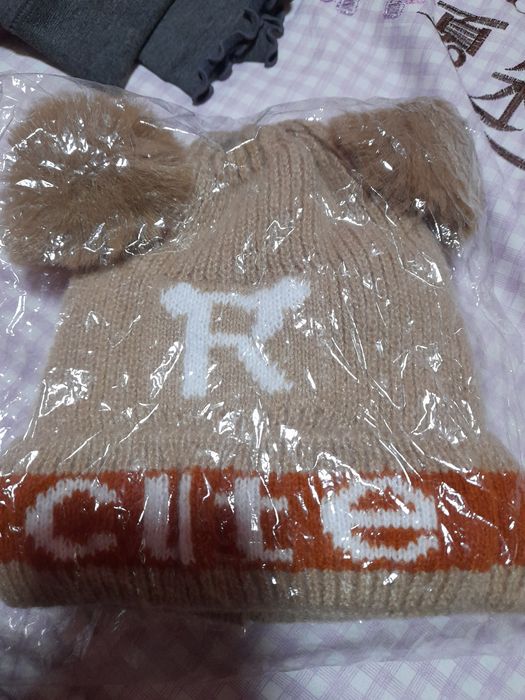 Ogil bollar shapkasi ichi mexlik qishki mavsumga mos