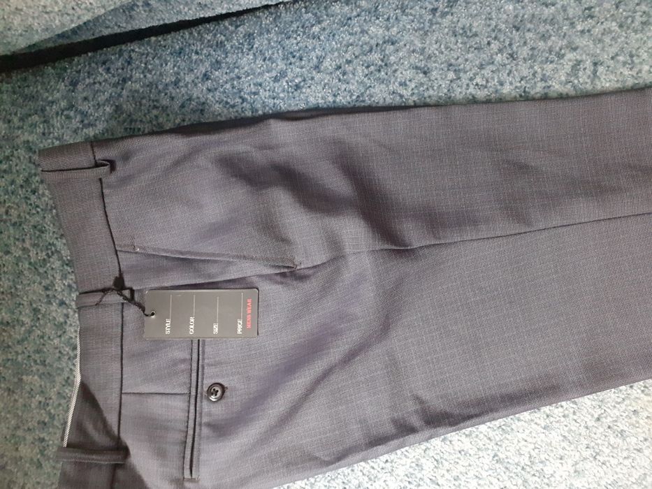 Новые мужские брюки