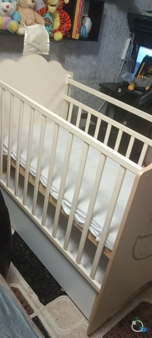 Детская кроватка маятник