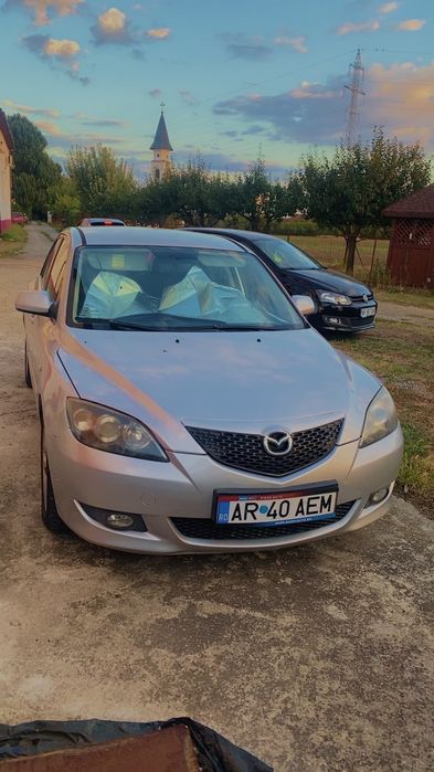 Vănd mazda M1 2004