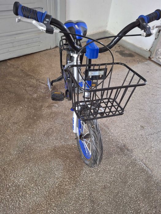Bicicleta copii cu roti de 12,este ca si noua folosita de doua ori