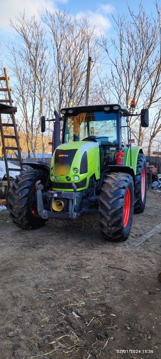 Tractor Claas Ares 577 ATZ + plug
