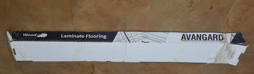 Продам ламинат серый 9шт пачка