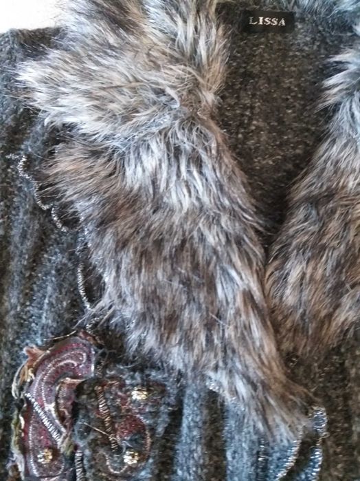 Топла, уникална жилетка