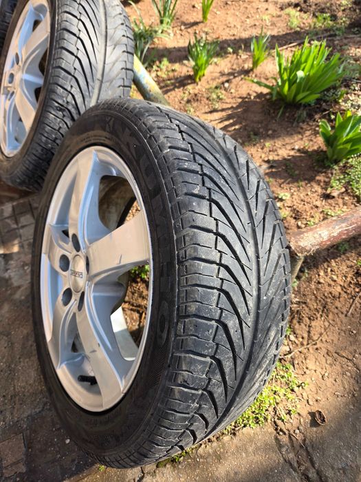 4 бр. алуминиеви джанти 15 цола с летни гуми 195/50 R15 – комплект