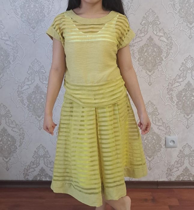 Одежды 42 размера