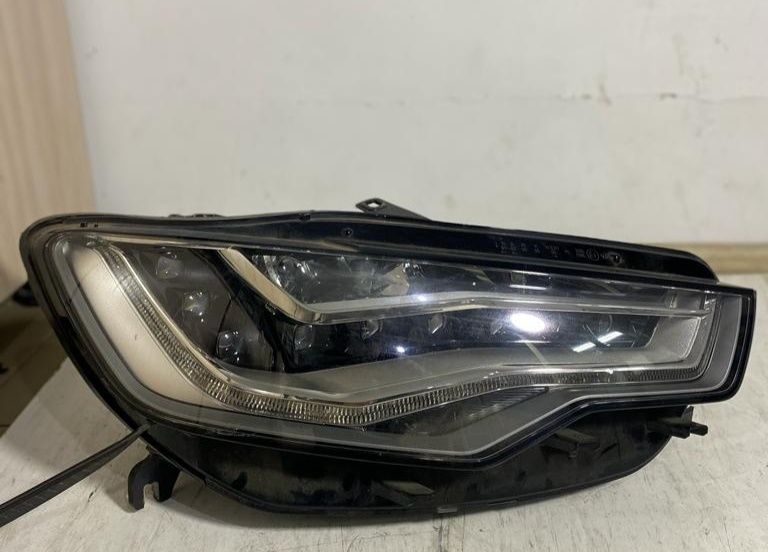 Привозные фары на Audi A6C7