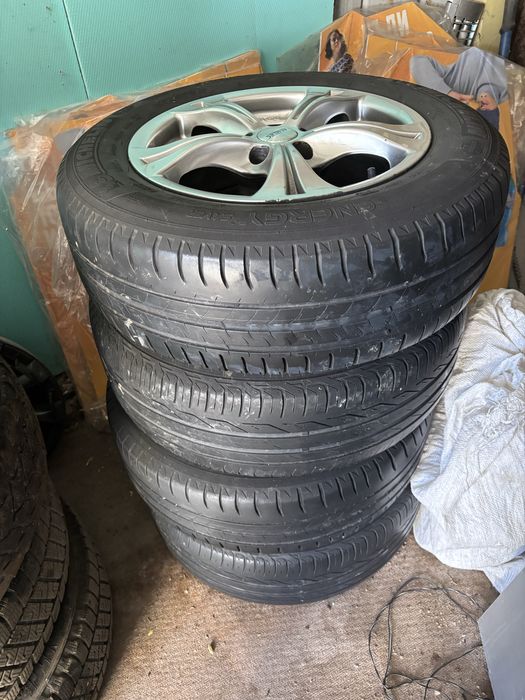 Джанти с гуми 5х100. 15 ки
