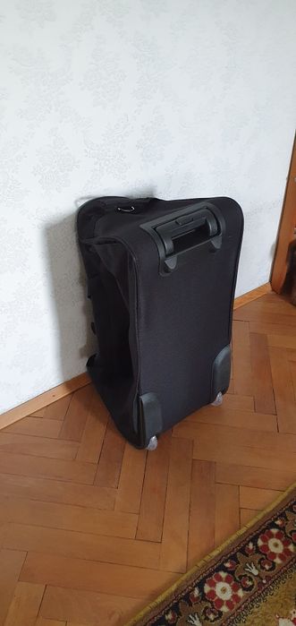 Чанта за пътуване на колела и с дръжка