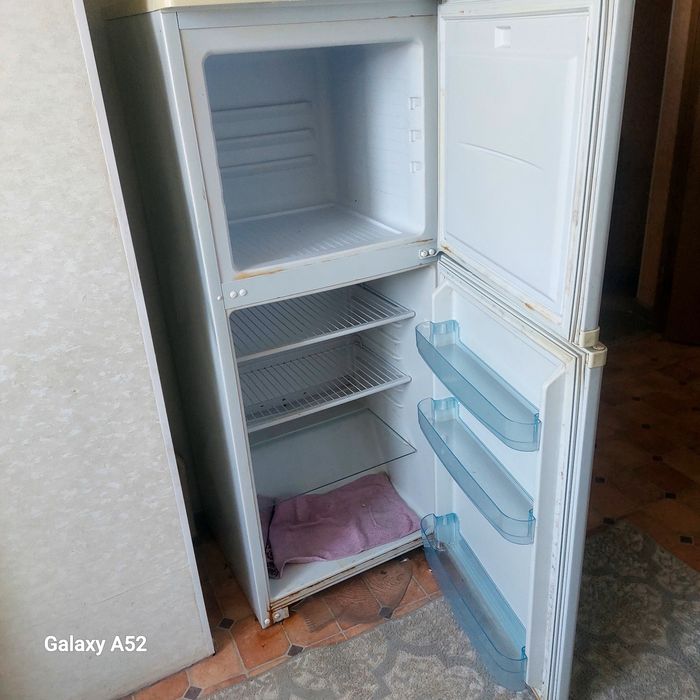 Холодильник бу снаиге