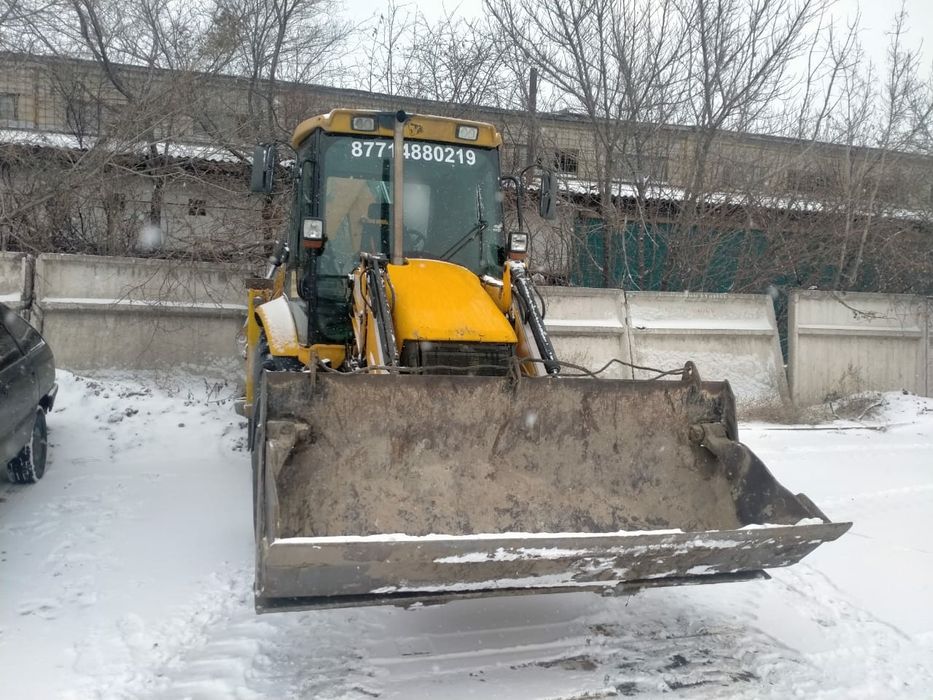 Услуги экскаватора погрузчика