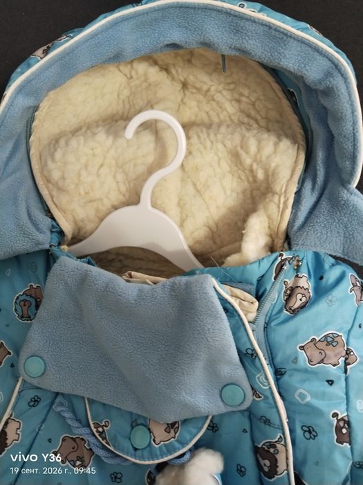 Срочно продам детский зимний комбинезон.