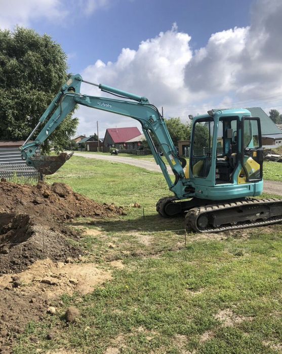 Мини экскаватор.