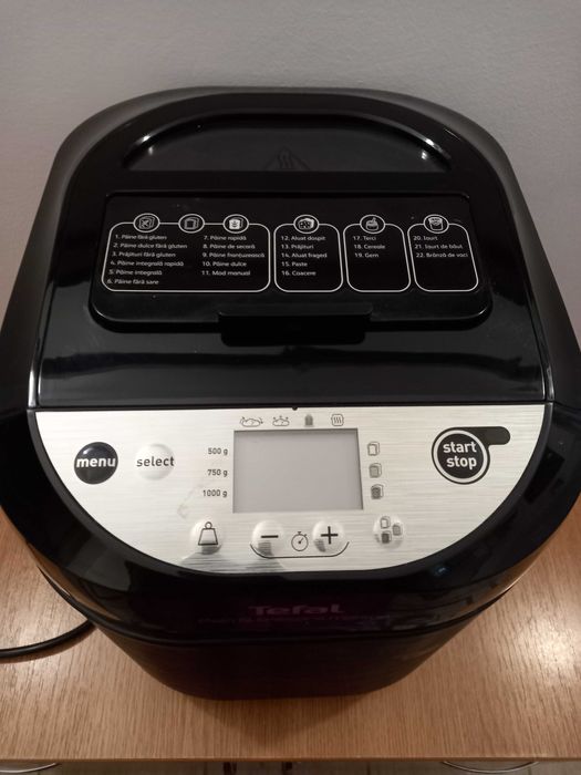 Masina paine Tefal si storcator fructe Braun