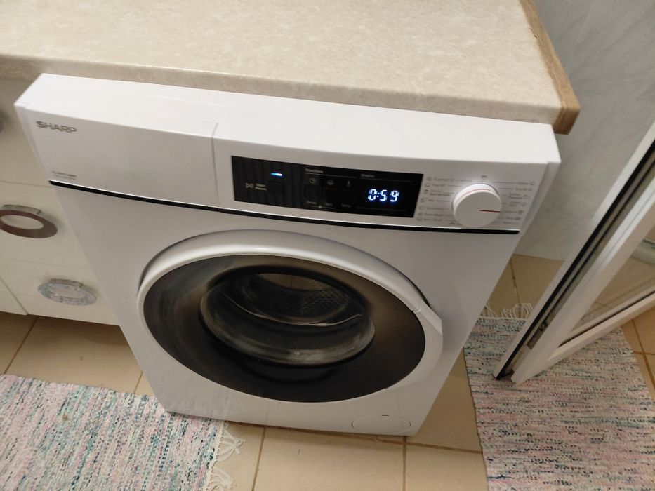 Masina de spalat rufe Sharp 7 kg 1400 rp are 1an si ceva