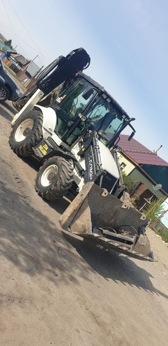 Услуги экскаватора погрузчика