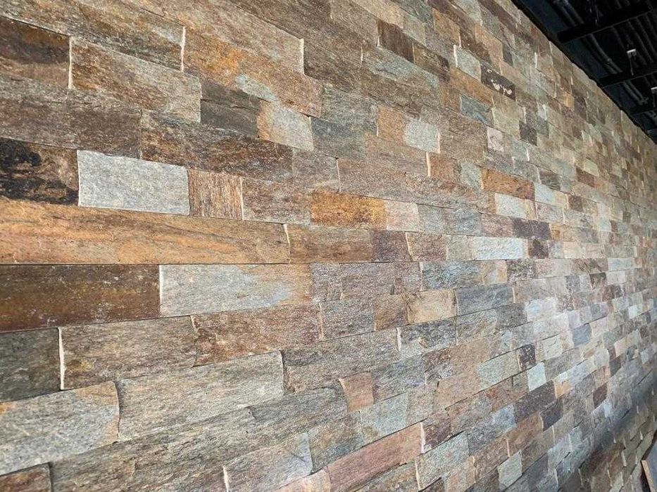 Облицовка дома натуральным камнем