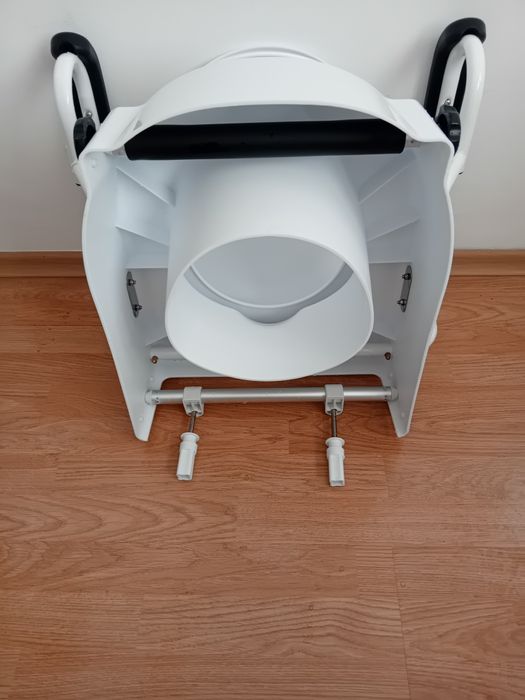 Повдигаща седалка за тоалетна с дръжки