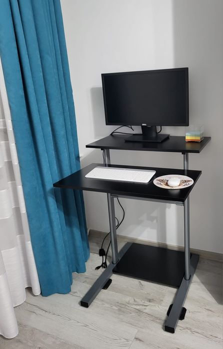 Birou reglabil pe înalțime