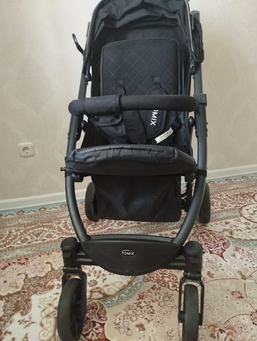 Продам коляску Tomix оригинал в отличном состоянии