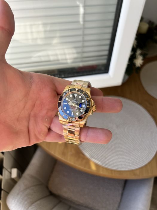 Rolex Submariner Gold And Black 41mm